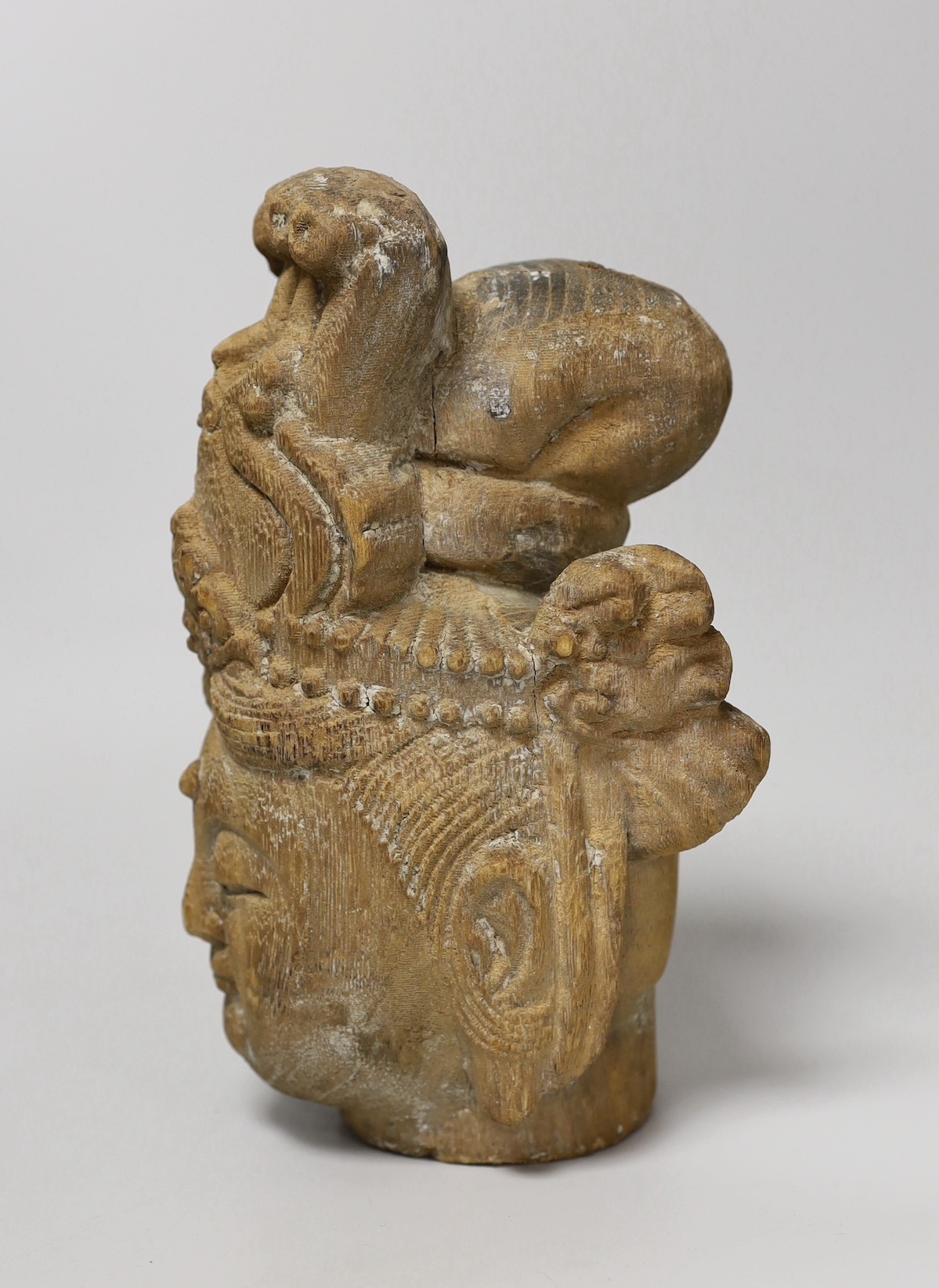 A Chinese Tang style wood head. 24cm high